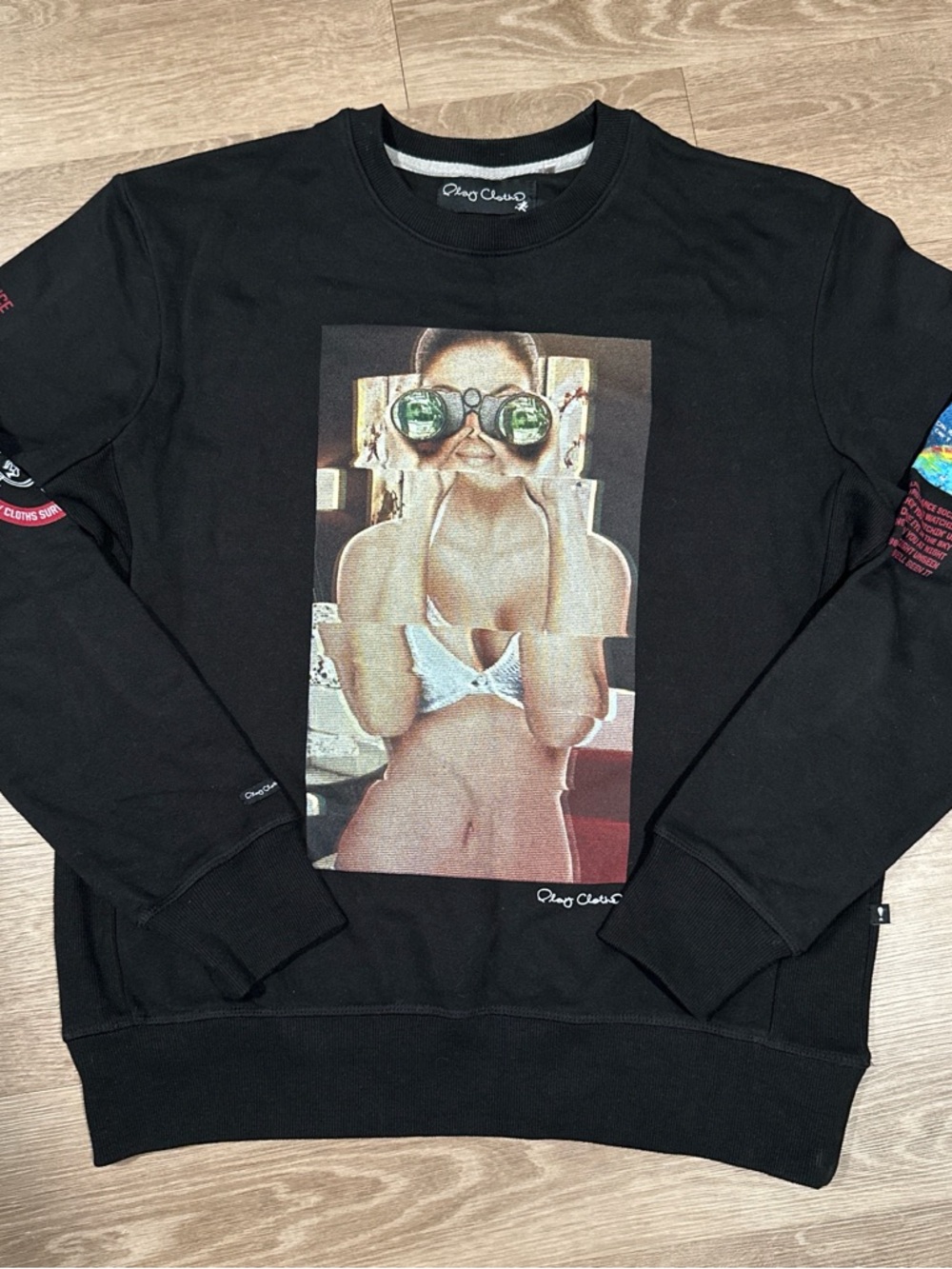 Classic Black Crewneck Sweater with Graphic Front